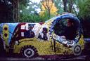 Ashe driving a tiled car near Grants Tomb.
